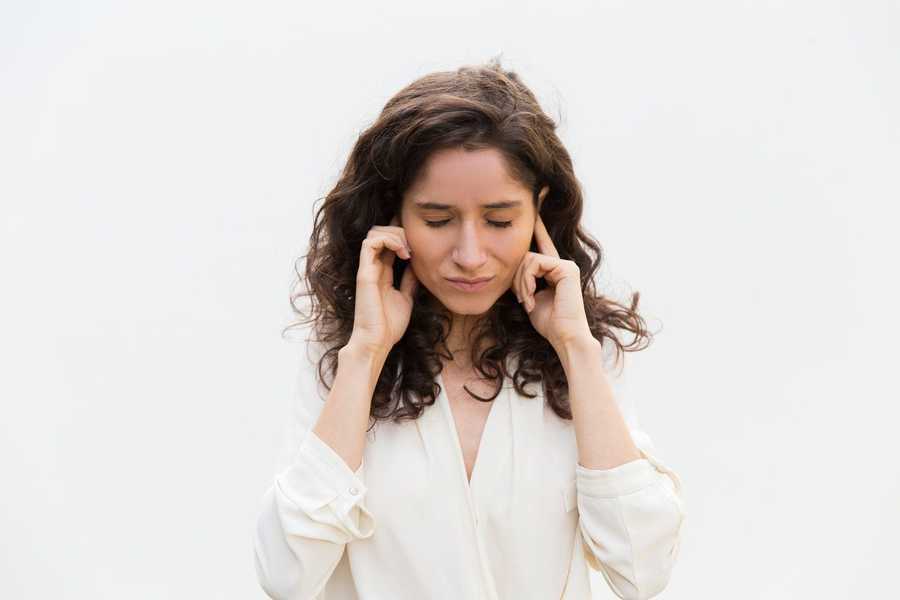 Woman with Fingers in Her Ears