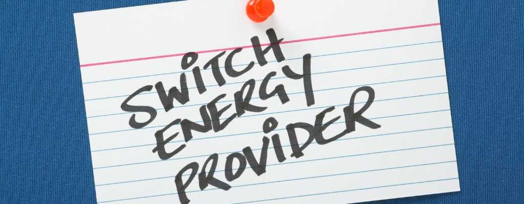 switch energy provider written on lined paper pined to a blue notice board 