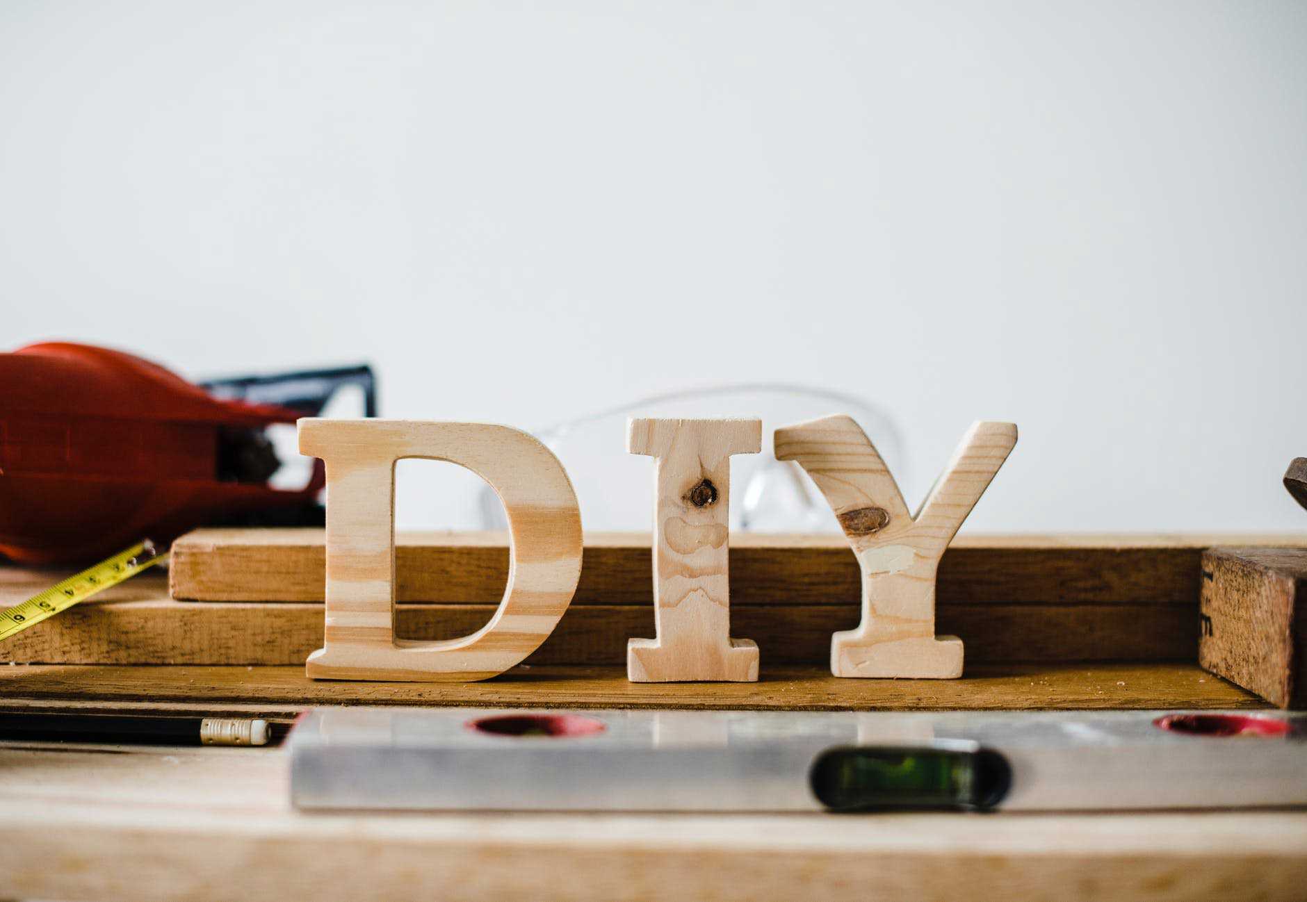 DIY in Wooden Letters on Work Bench