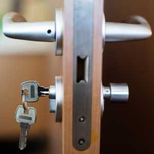 a key in a brown door