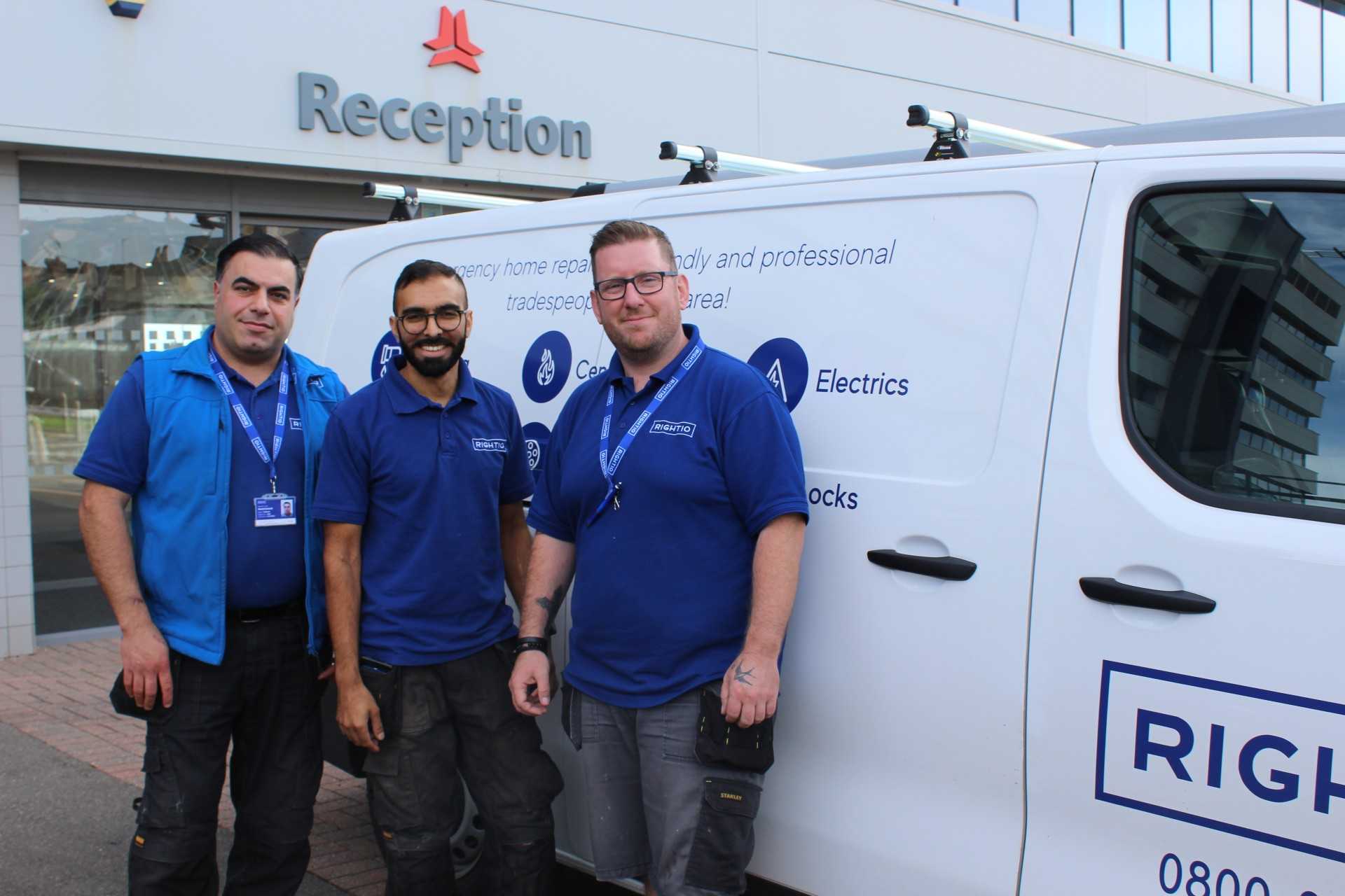 Three Rightio engineers standing in front of a Rightio van in full uniform smiling