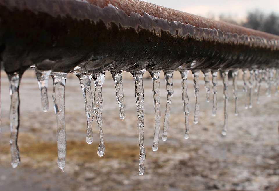 Icicles Running along Pipe