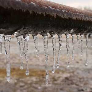 Icicles Running along Pipe