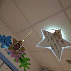 Plastic Stars with Message Hanging from The Ceiling