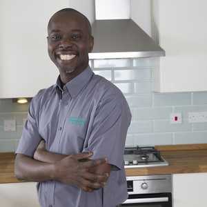 Engineer Smiling in Kitchen