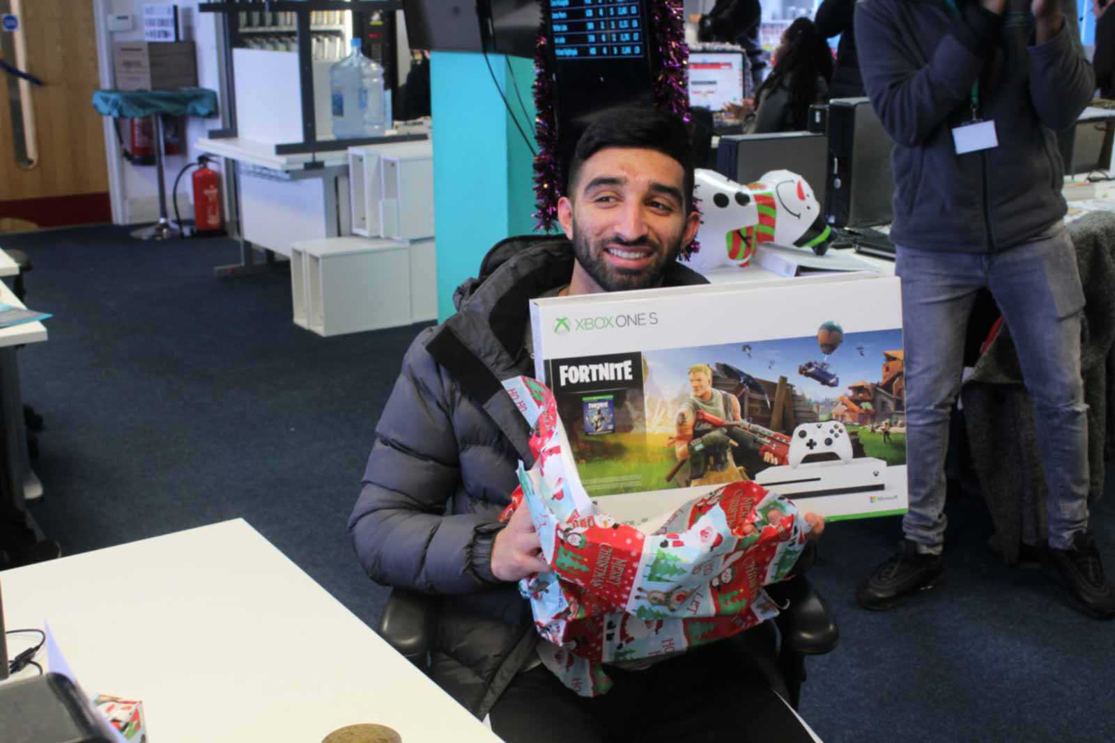 Zeeshan Hussain with Xbox One S at Christmas Raffle