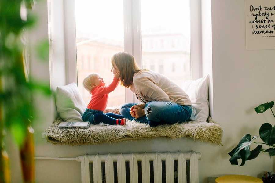 Woman and Child in Front A Window